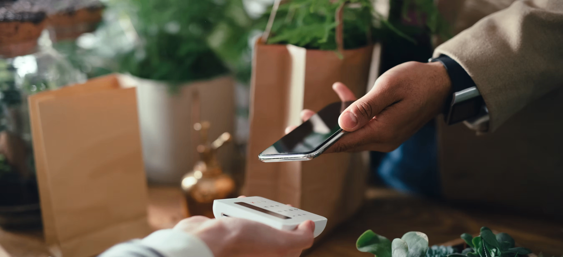 Modern payment terminal on a marble counter